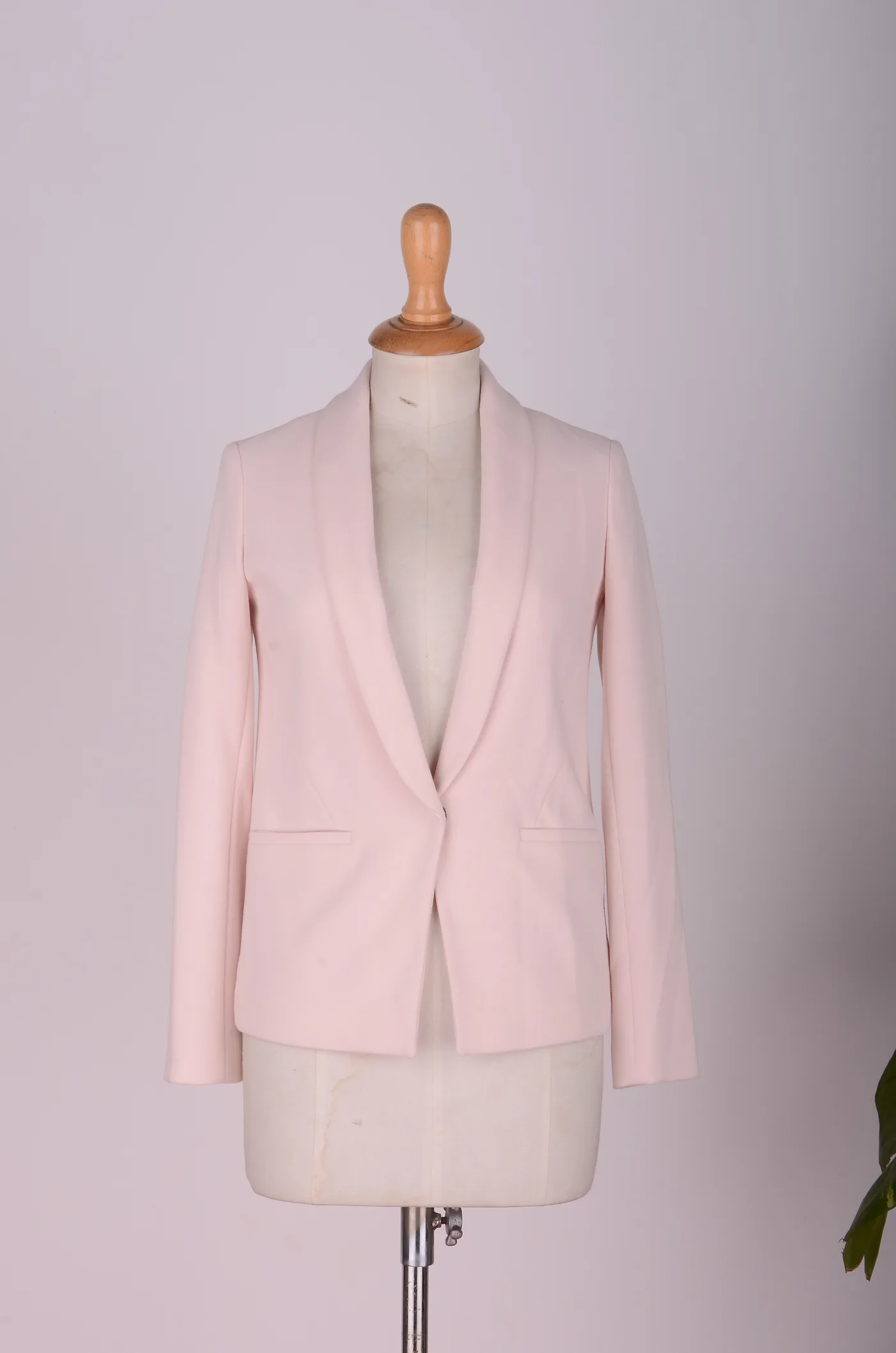Pale pink tailored blazer on a mannequin, Outfitters Winter 2016
