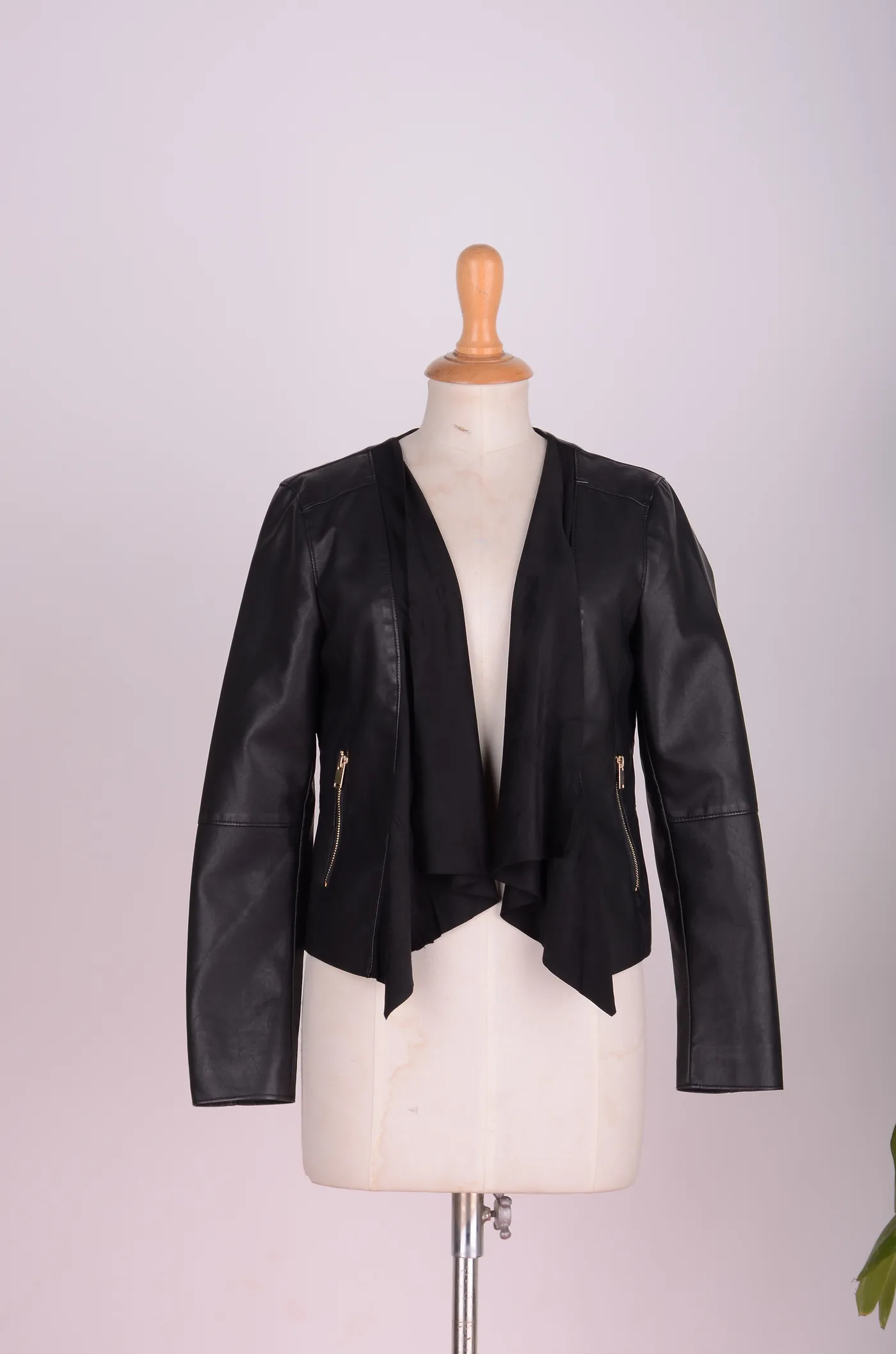 Black leather-look jacket on a mannequin, Outfitters Winter 2016