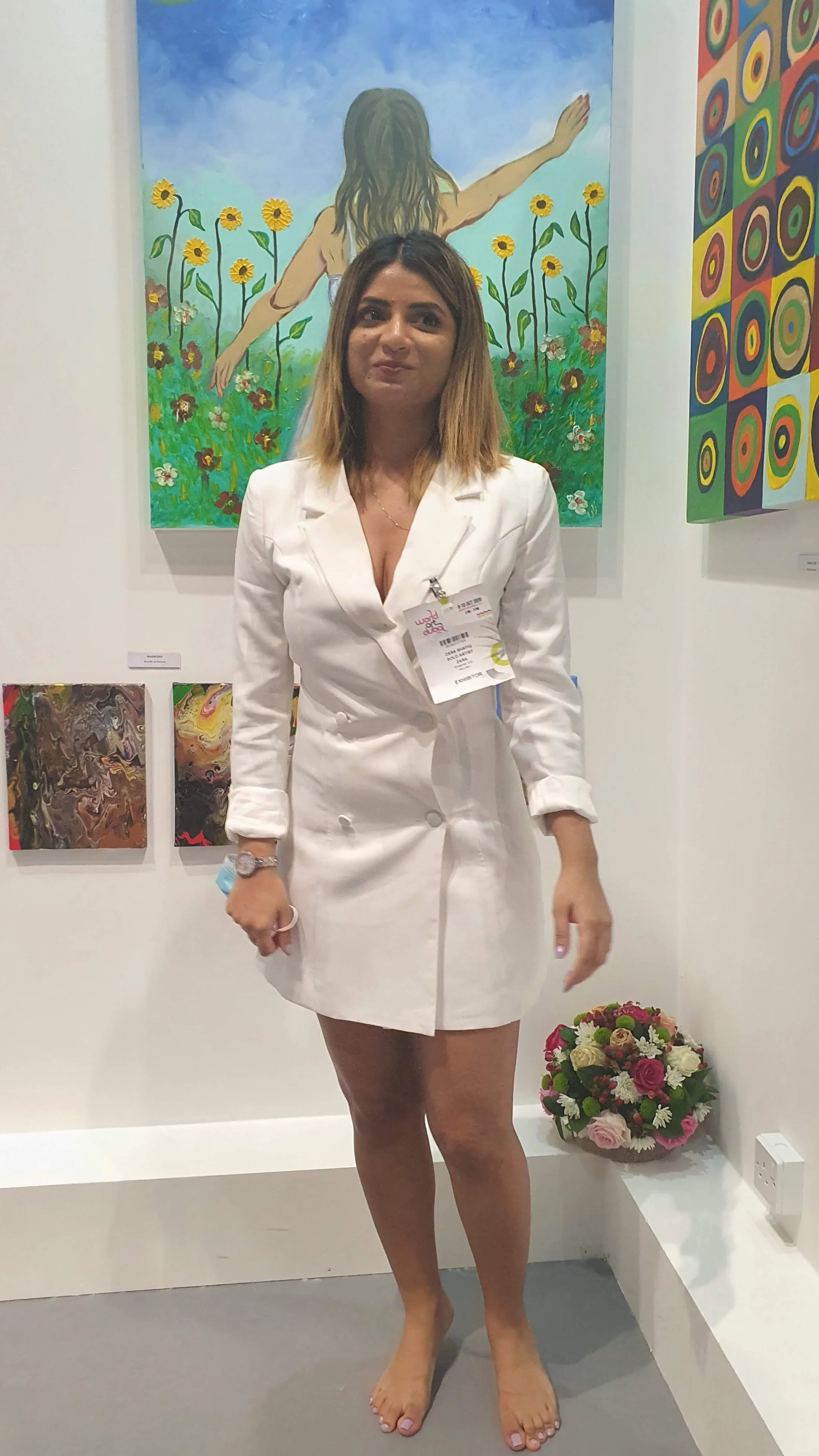 Zara Shafiq Khan standing at the Wabi Sabi stand, World Art Dubai 2020